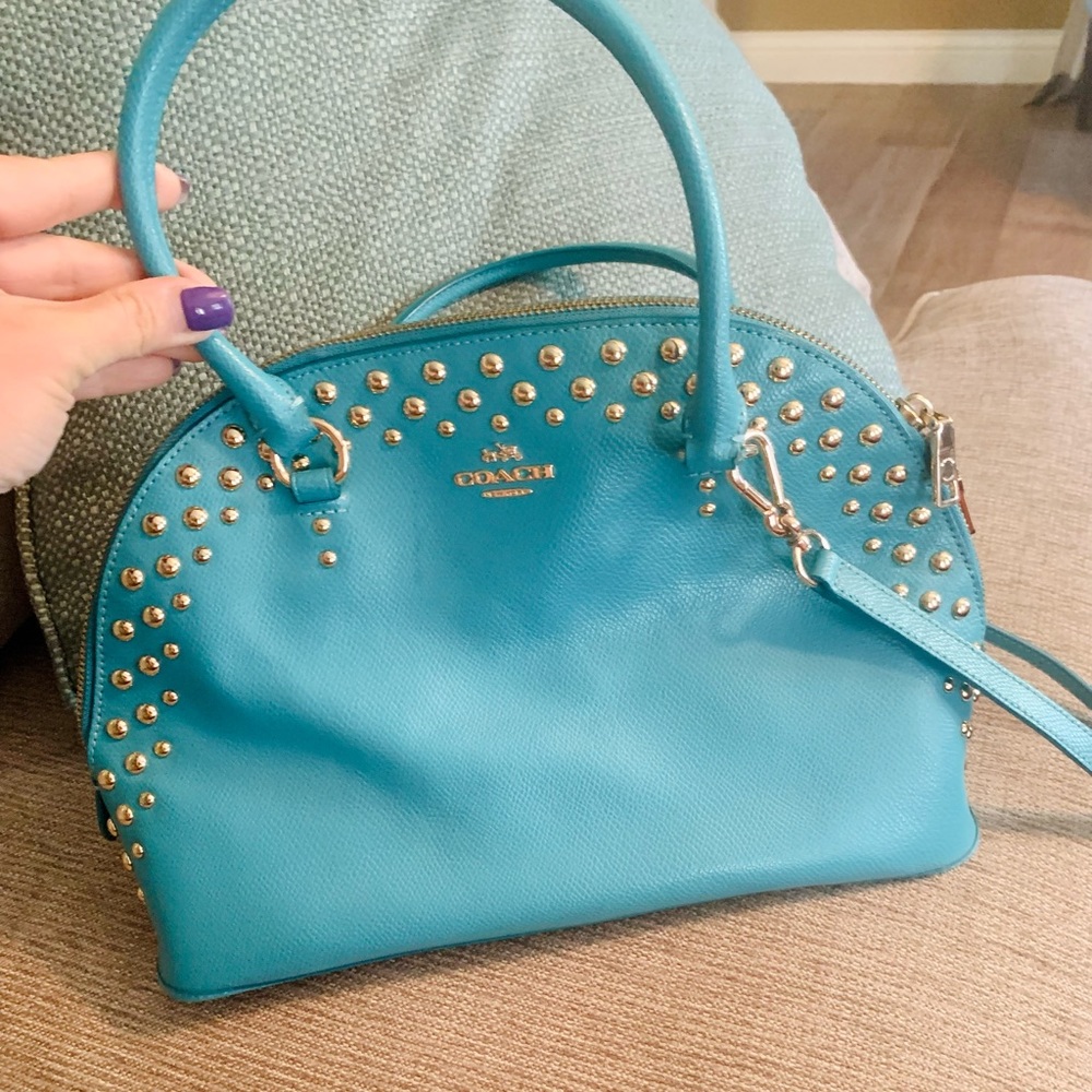 Coach bag. Can be used as a cross body or a shoulder bag.